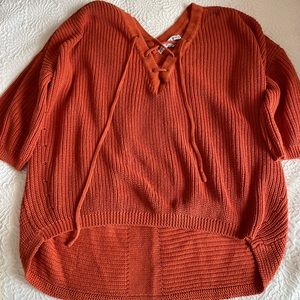 orange sweater